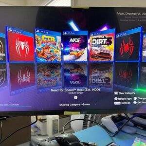 PS4 Game Collection with Blue Cases